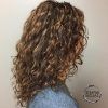 Layered Curly Medium Length Hairstyles (Photo 8 of 25)