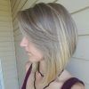 Feathered Haircuts With Angled Bangs (Photo 1 of 25)