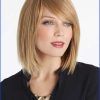 Layered Bob Hairstyles With Swoopy Side Bangs (Photo 11 of 25)