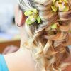 Curly Wedding Hairstyles With An Orchid (Photo 5 of 25)