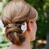 Twisted Low Bun Hairstyles For Wedding (Photo 24 of 25)