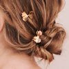 Sleek Bridal Hairstyles With Floral Barrette (Photo 13 of 25)