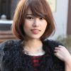 Messy Short Bob Hairstyles With Side-Swept Fringes (Photo 14 of 25)