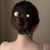 Bun Updo With Accessories For Thick Hair (Photo 12 of 25)