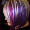 Voluminous Platinum And Purple Curls Blonde Hairstyles (Photo 16 of 25)