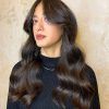 Loose Waves With Unshowy Curtain Bangs (Photo 8 of 18)