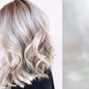 Pearl Blonde Bouncy Waves Hairstyles (Photo 21 of 25)