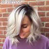 Dark Roots And Icy Cool Ends Blonde Hairstyles (Photo 11 of 25)