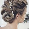Pearl Bun Updo Hairstyles (Photo 2 of 25)
