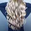 Pearl Blonde Bouncy Waves Hairstyles (Photo 9 of 25)