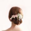 Floral Bun Updo Hairstyles (Photo 13 of 25)