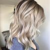 Pearl Blonde Bouncy Waves Hairstyles (Photo 17 of 25)