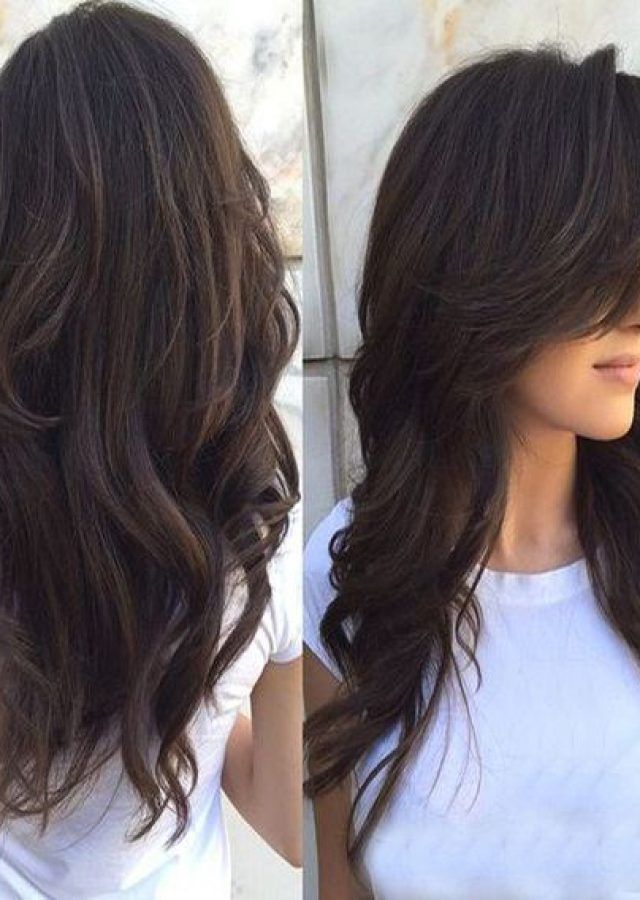 2024 Latest Messy Loose Curls Long Hairstyles with Voluminous Bangs