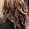 Dark Locks Blonde Hairstyles With Caramel Highlights (Photo 8 of 25)
