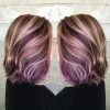 Voluminous Platinum And Purple Curls Blonde Hairstyles (Photo 1 of 25)