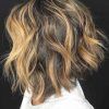 Short Asymmetric Bob Hairstyles With Textured Curls (Photo 20 of 25)