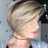 Short Ash Blonde Bob Hairstyles with Feathered Bangs