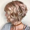 Angled Brunette Bob Hairstyles With Messy Curls (Photo 17 of 25)