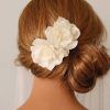 Side Bun Prom Hairstyles With Orchids (Photo 3 of 25)