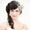 Curly Bridal Bun Hairstyles With Veil (Photo 17 of 25)