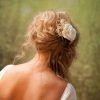 Curly Wedding Updos With Flower Barrette Ties (Photo 5 of 25)
