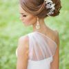 Veiled Bump Bridal Hairstyles With Waves (Photo 7 of 25)