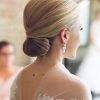 Sleek Bridal Hairstyles With Floral Barrette (Photo 10 of 25)