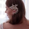 Sleek Bridal Hairstyles With Floral Barrette (Photo 20 of 25)
