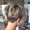 Short Side Swept Pixie Haircuts With Caramel Highlights (Photo 19 of 25)