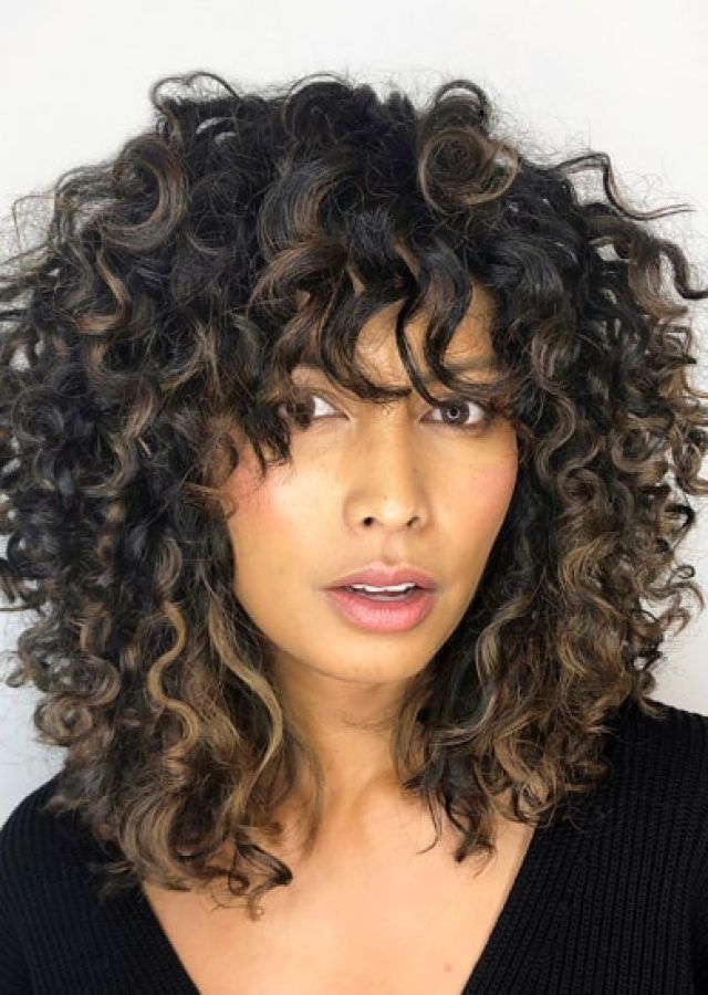2024 Popular Layered Curly Medium Length Hairstyles