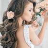 Curly Wedding Hairstyles With An Orchid (Photo 13 of 25)