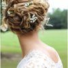 Bohemian Curls Bridal Hairstyles With Floral Clip (Photo 16 of 25)