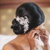 Wedding Low Bun Bridal Hairstyles (Photo 14 of 25)