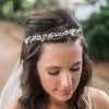 Side Bun Prom Hairstyles With Jewelled Barrettes (Photo 11 of 25)