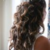 Curly Wedding Updos With Flower Barrette Ties (Photo 10 of 25)