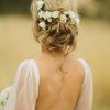 Bohemian Curls Bridal Hairstyles With Floral Clip (Photo 3 of 25)