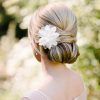 Sophisticated Pulled Back Cascade Bridal Hairstyles (Photo 19 of 25)