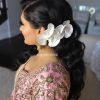 Curly Wedding Hairstyles With An Orchid (Photo 8 of 25)