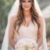 Veiled Bump Bridal Hairstyles With Waves (Photo 25 of 25)