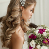 Large Curly Bun Bridal Hairstyles With Beaded Clip (Photo 15 of 25)