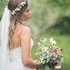 Wedding Hairstyles With Veil And Flower (Photo 2 of 15)