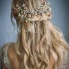 Half Up Wedding Hairstyles With Jeweled Clip (Photo 2 of 25)