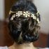 Top 25 of Wavy Low Bun Bridal Hairstyles with Hair Accessory