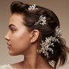 Half Up Wedding Hairstyles With Jeweled Clip (Photo 24 of 25)