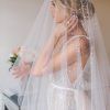 Wedding Hairstyles With Extra-Long Veil With A Train (Photo 13 of 25)