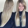 Sun-Kissed Blonde Hairstyles With Sweeping Layers (Photo 11 of 25)