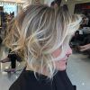 Angled Brunette Bob Hairstyles With Messy Curls (Photo 14 of 25)