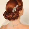 Curly Wedding Updos With Flower Barrette Ties (Photo 11 of 25)